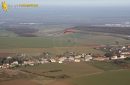 Paramotor flying over Soindres village in the Yvelines department